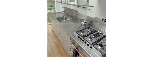 Stainless steel sinktop with drainer recess, integral back upstand, lipped front and side edges