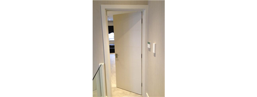 Bespoke internal white door with grooves