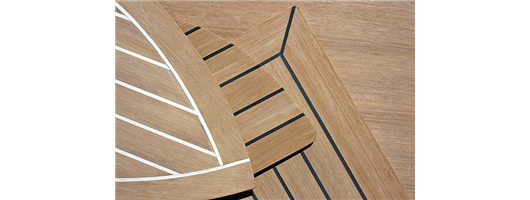 Rigid synthetic decking co-extruded to look and feel like real teak