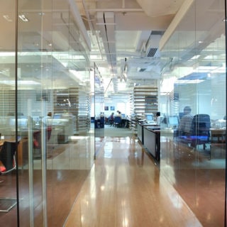 Glass Partitions Separating Various Individual Rooms