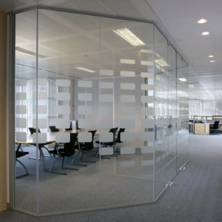 Glass Partitioning with Frost Pattern Separating a Board Room