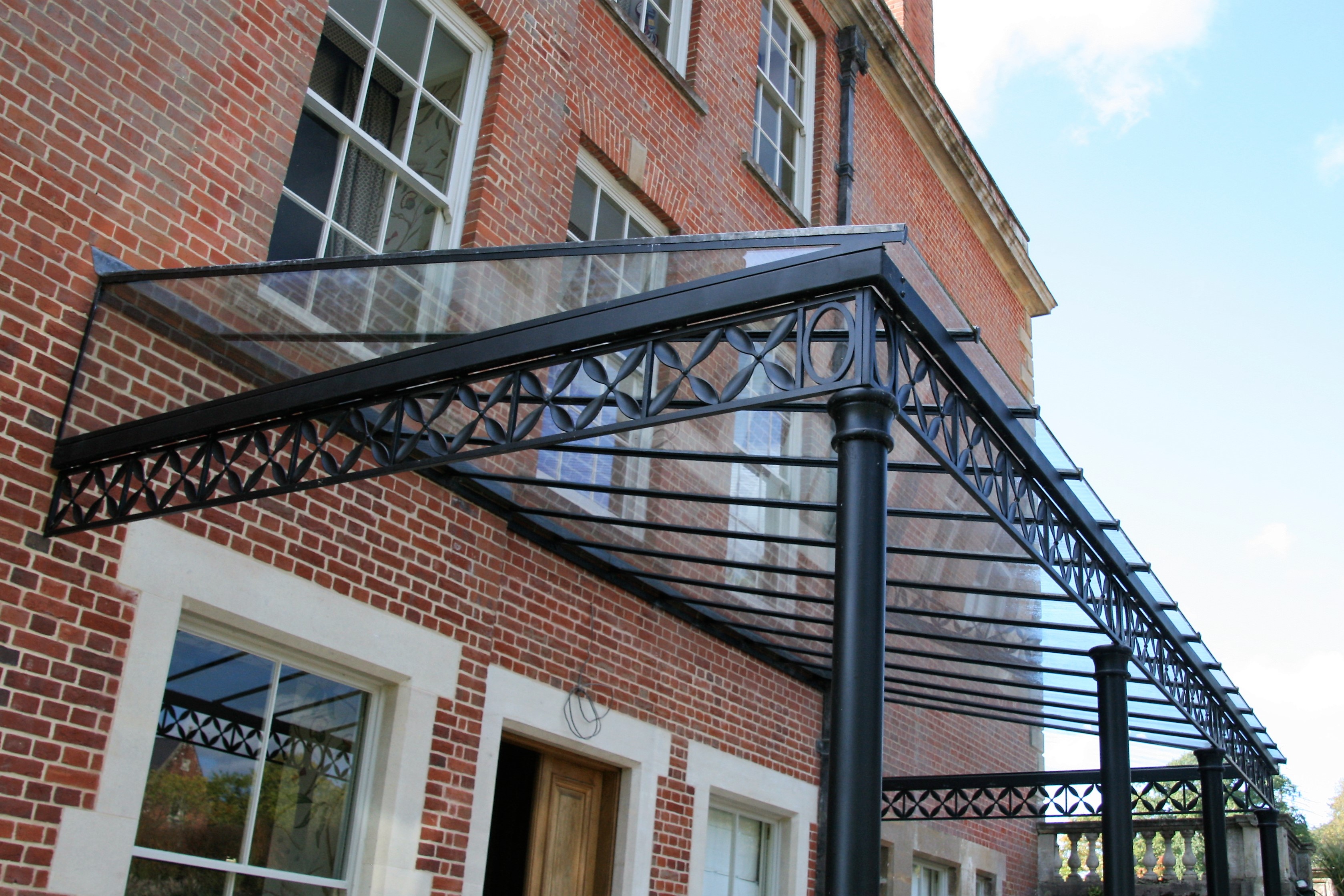 Column Veranda with Bespoke Frieze Panels & Glazing Bar Roof, Finished with Clear Glass