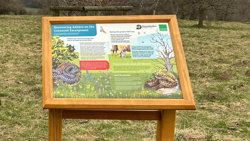 An A1 size interpretation panel produced in Encapsulated Glass Reinforced Plastic (GRP) and supplied with an Oak & Accoya lectern frame