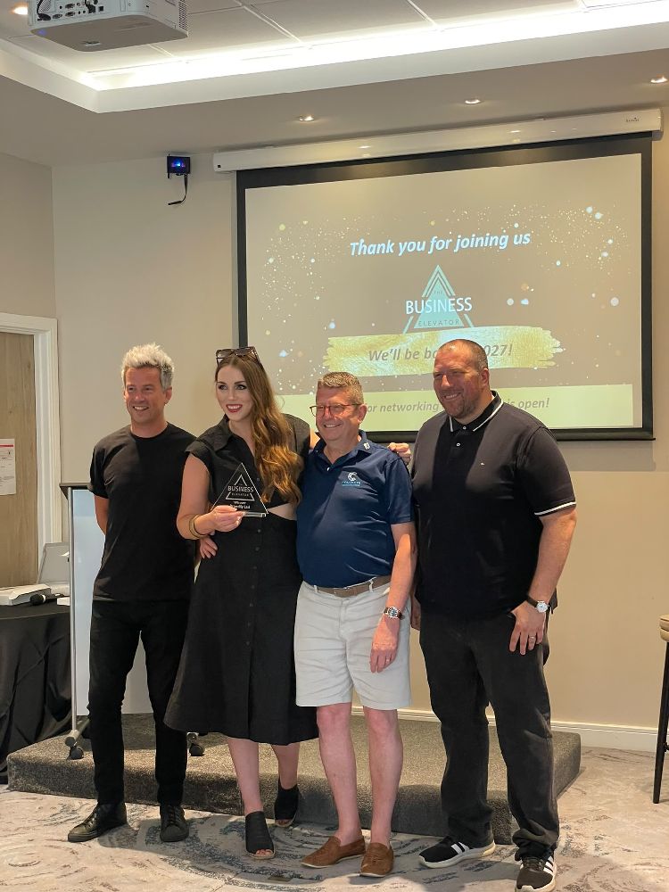 Brandily celebrates winning the Business Elevator Award