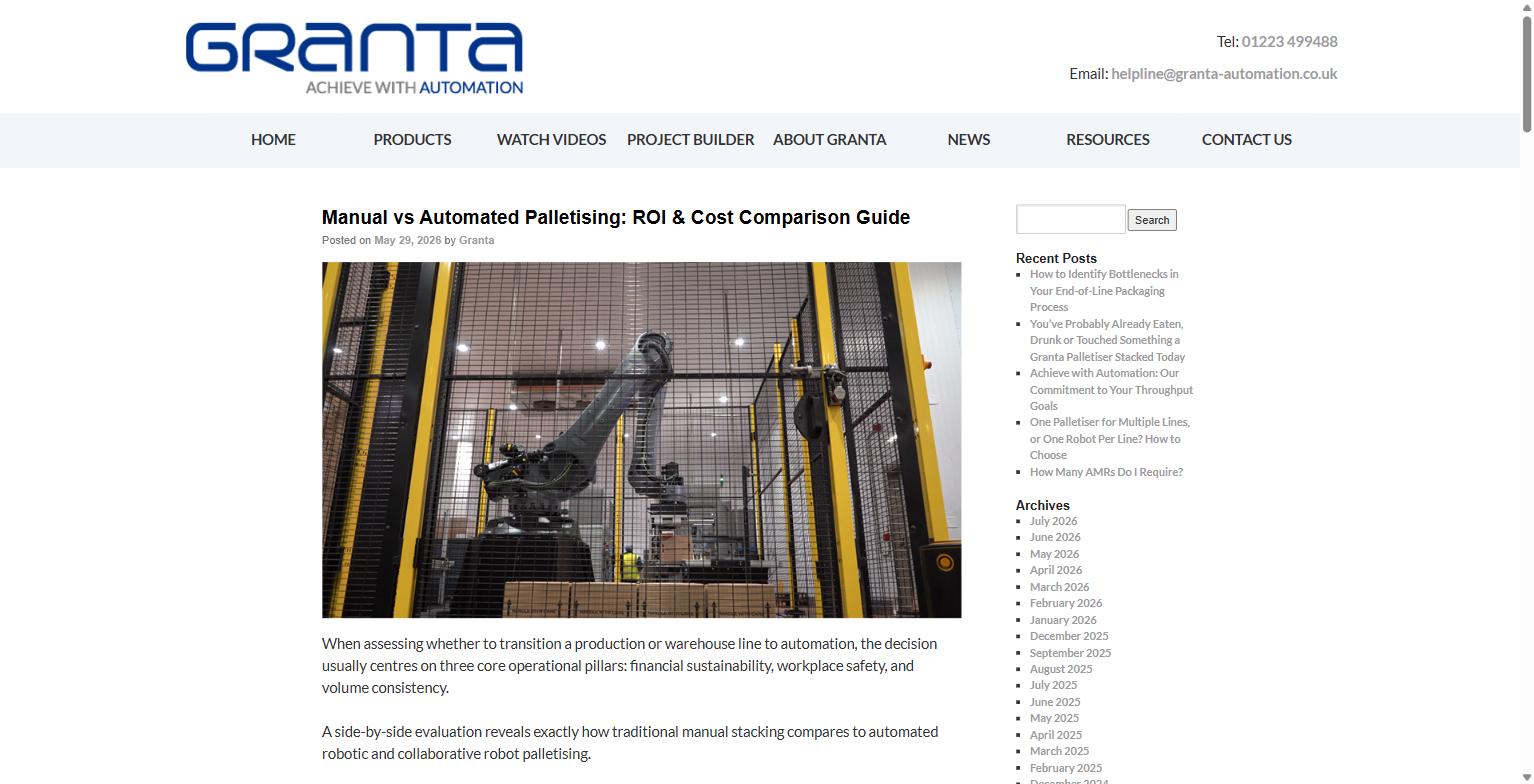 Robotic palletiser arm working inside a safety-fenced cell