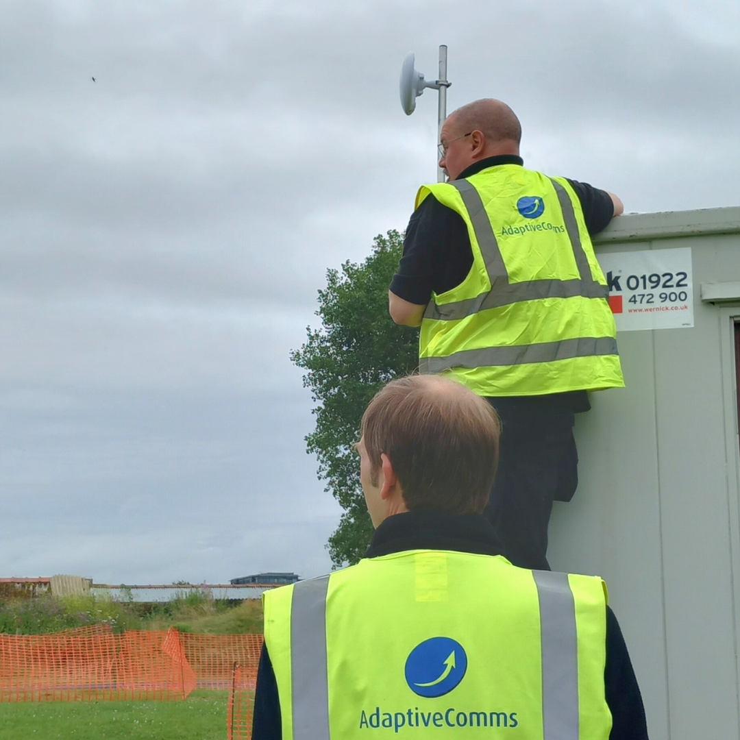 AdaptiveComms Engineer Installing Event WiFi