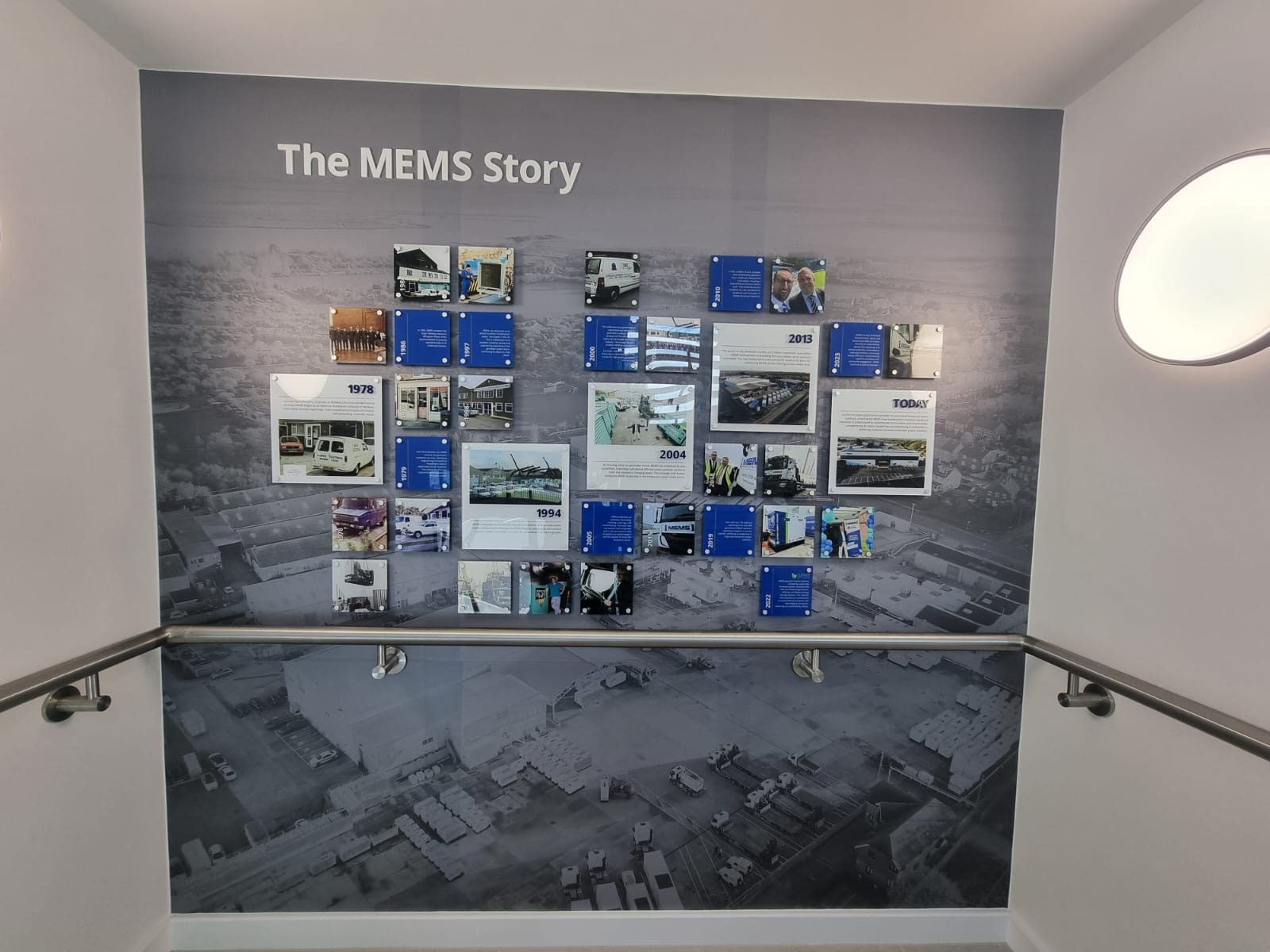 Collage of printed perspexes on an interior wall