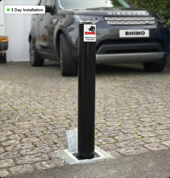 Black Steel Lift-Assist Telescopic Driveway Bollard in Surrey