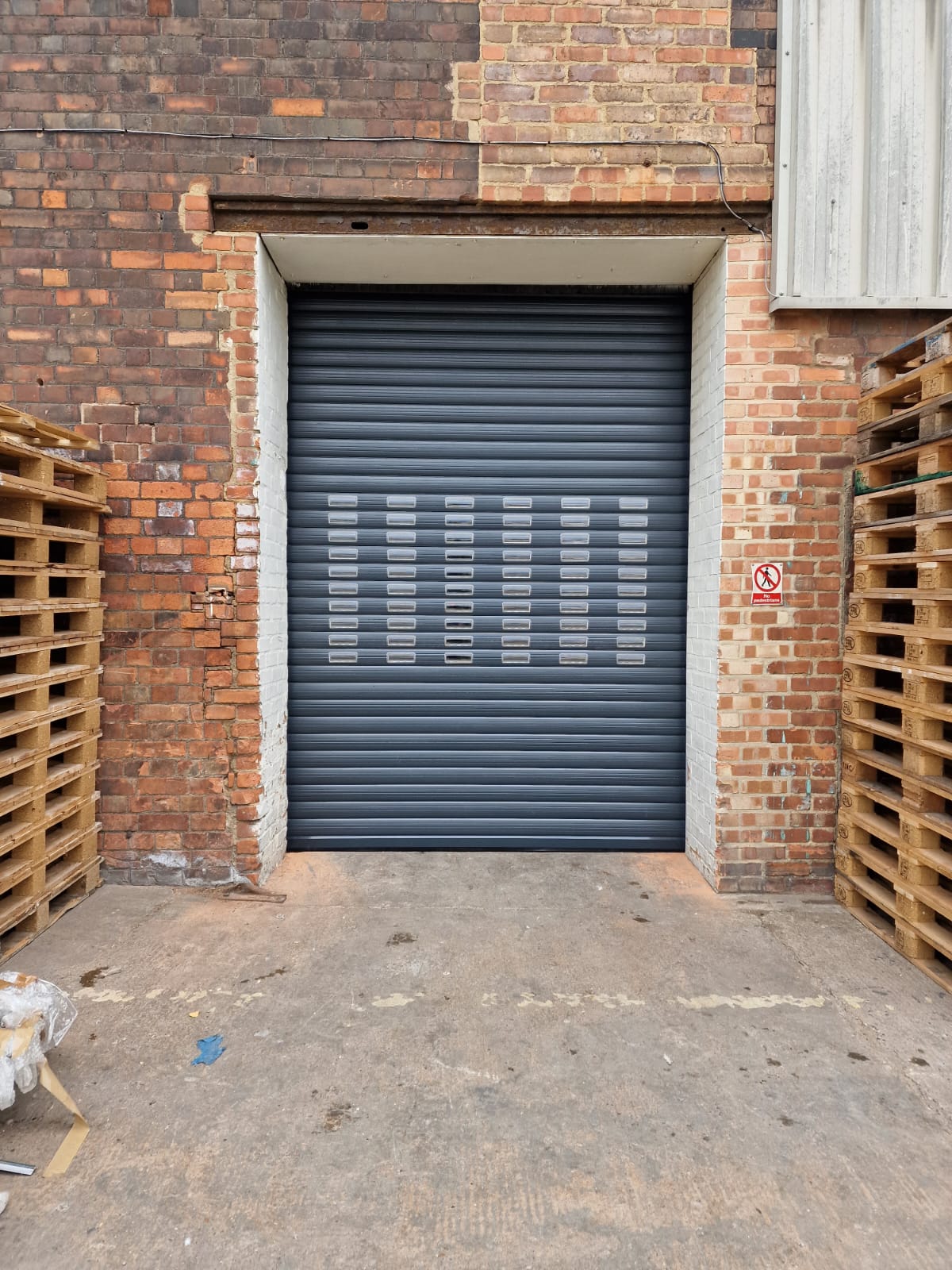 Roller shutter with perforated laths