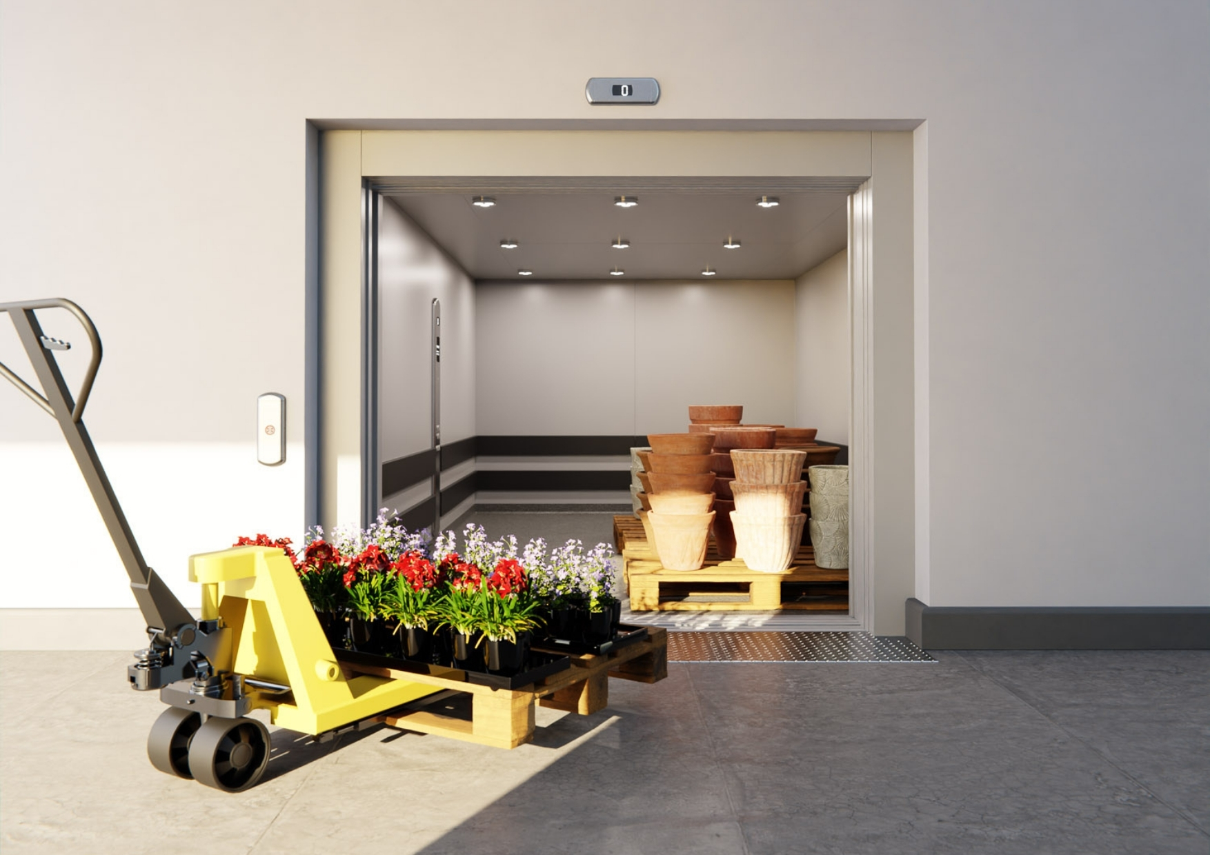 Open goods lift with pallets inside containing large plant pots, while a pallet truck loaded with trays of flowers sits at the entrance.
