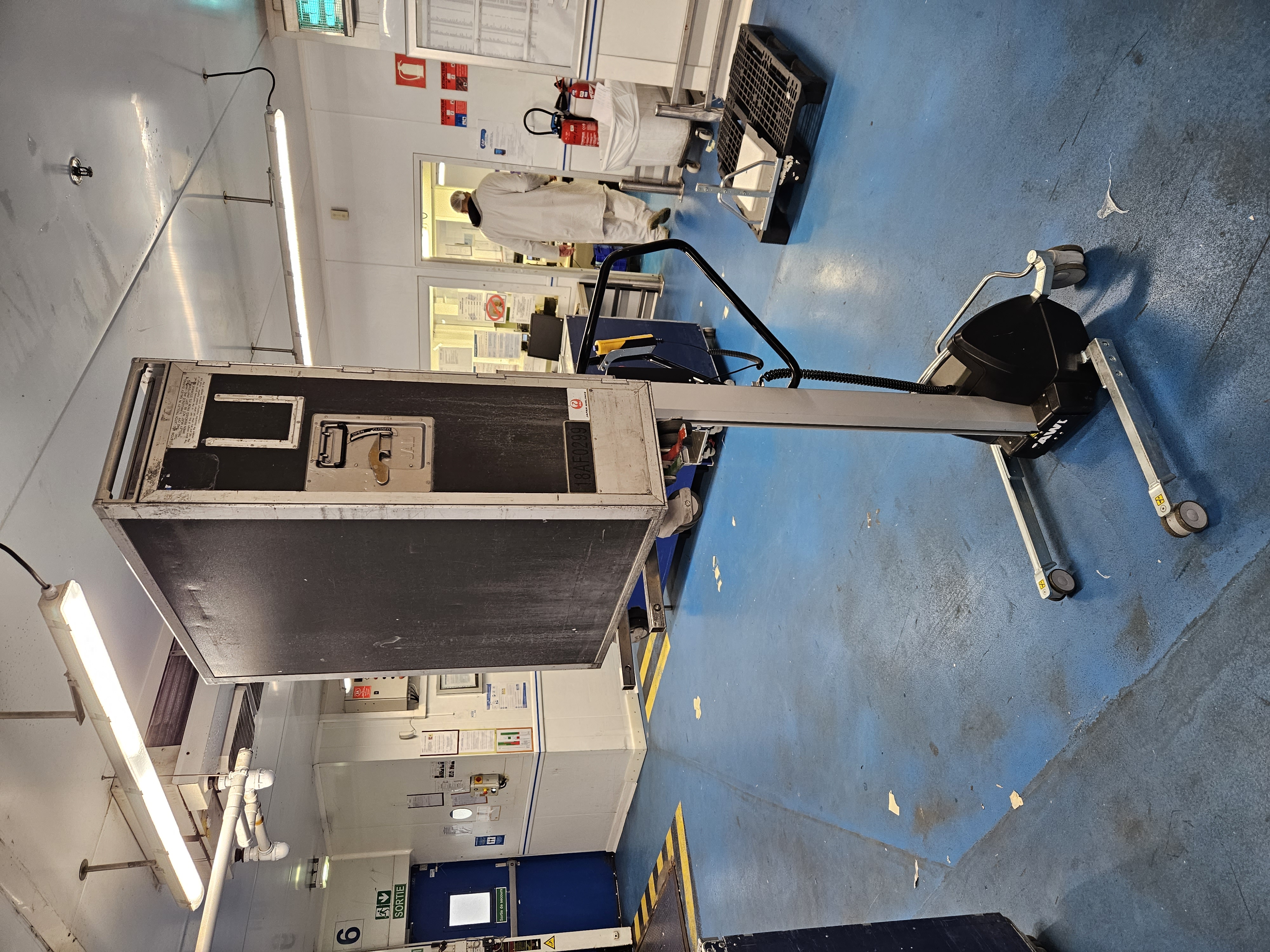 Airline food trolley on a TAWI lifting trolley