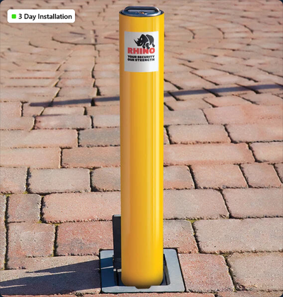 Yellow Powder Coated Steel Telescopic Driveway Bollard in Essex