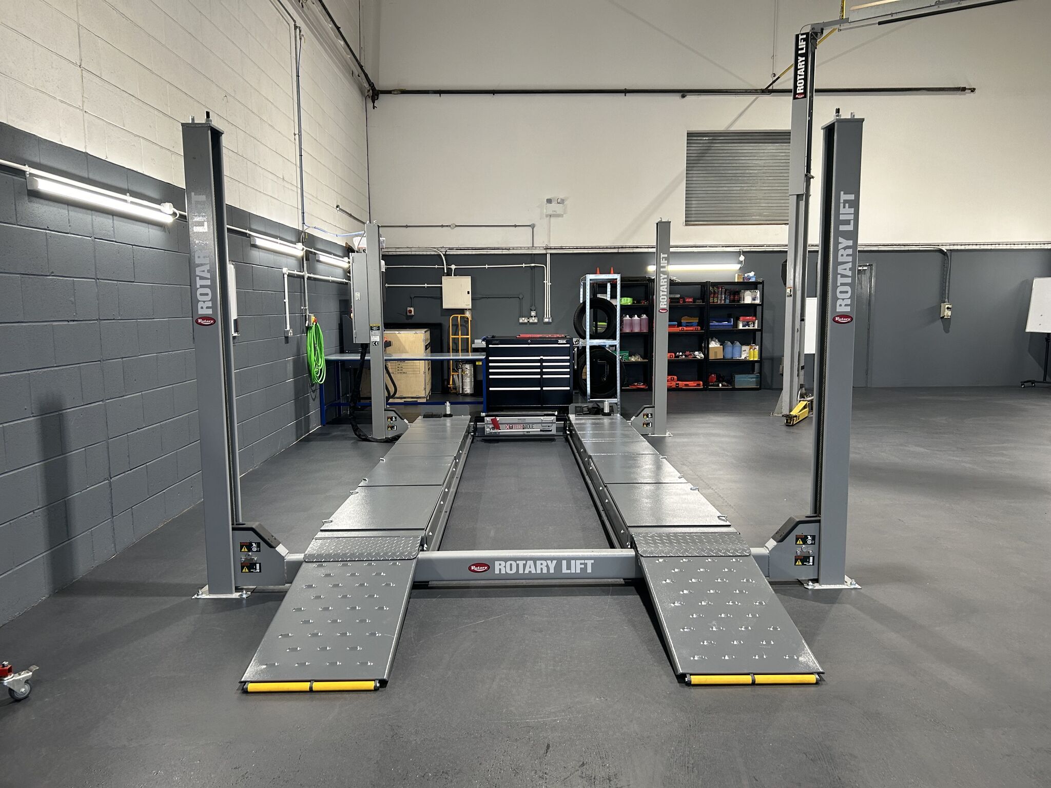 Stoneacre training facility with car ramps on ecotile interlocking floor tiles