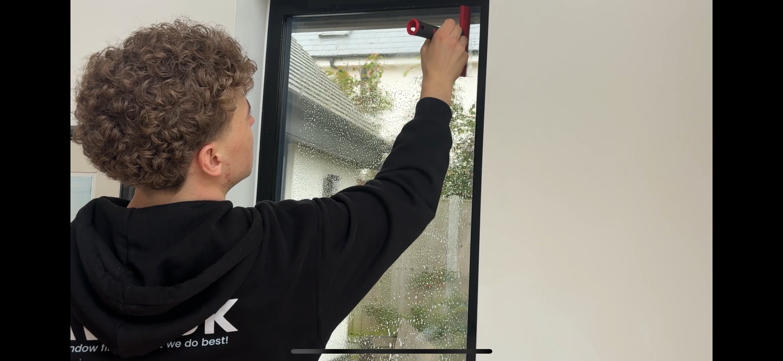 Image of george installaing window film