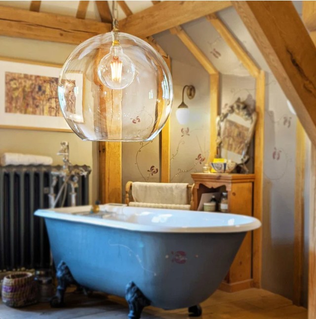 soho xxl globe light in a farmhouse bathroom