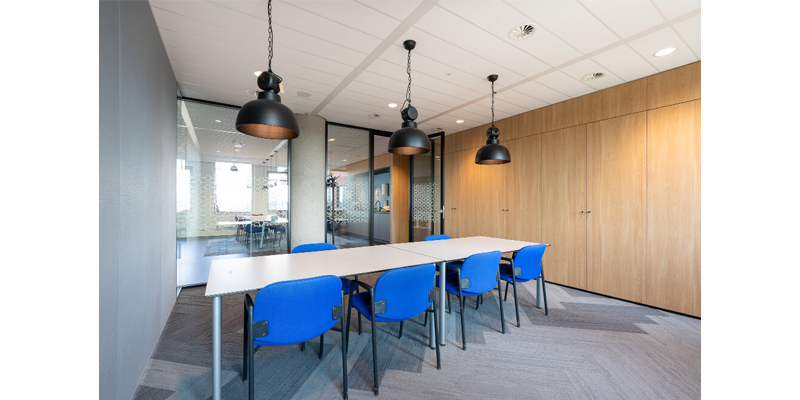 https://www.commercialmezzanine.co.uk/wp-content/uploads/2023/11/meeting-room-interior-modern-office-with-long-wooden-table-chairs-around-it-1.jpg
