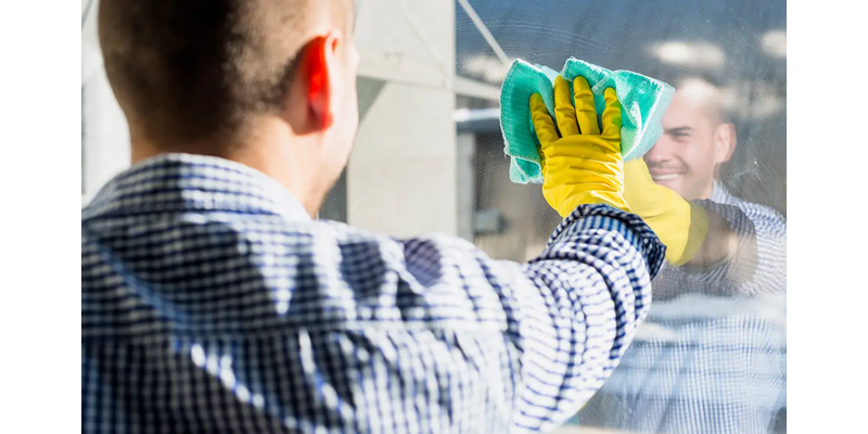 https://www.glasspartitionsdirect.co.uk/go-to-admin/images/blog/Man-clening-glass.webp