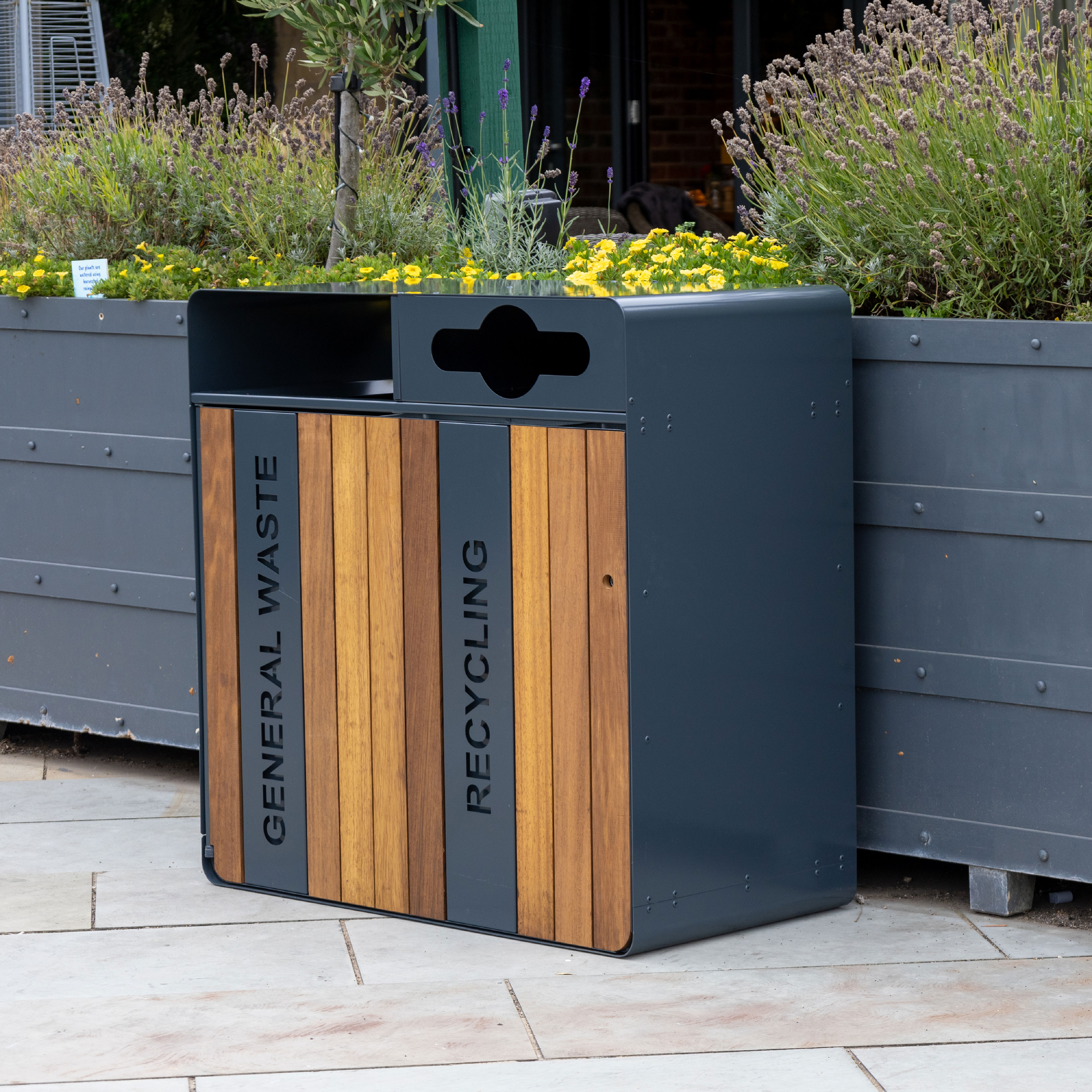 Contour Double Recycling unit with Iroko panelling and galvanized steel detailing and apertures