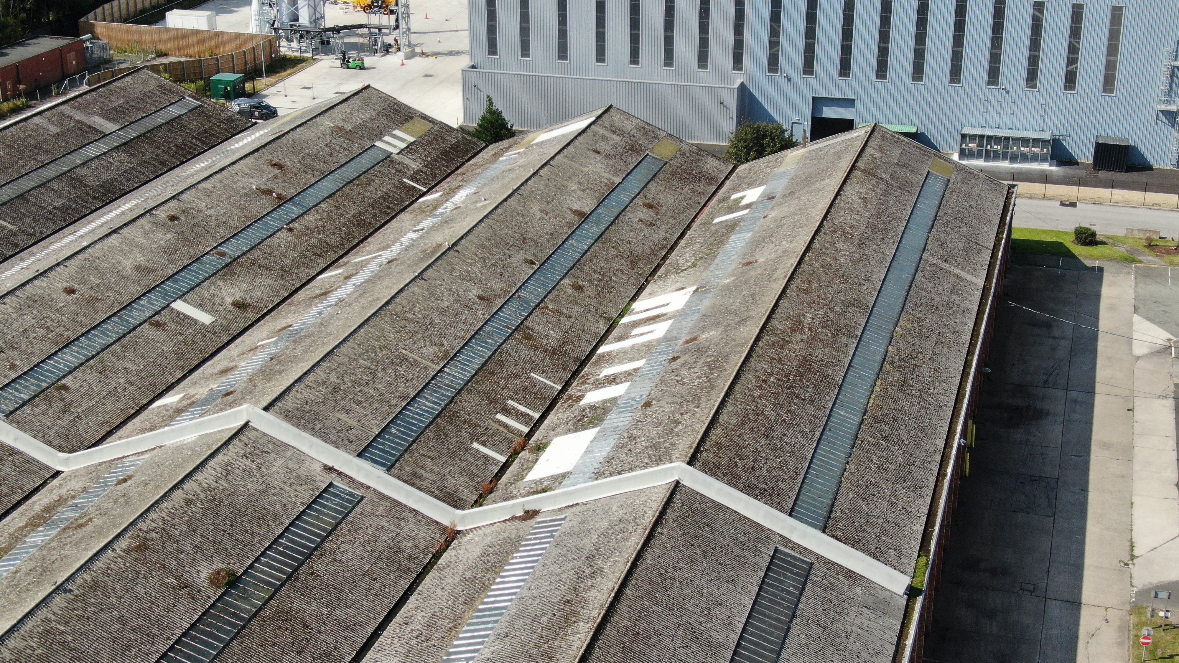 Commercial asbestos roof overcladding & replacement