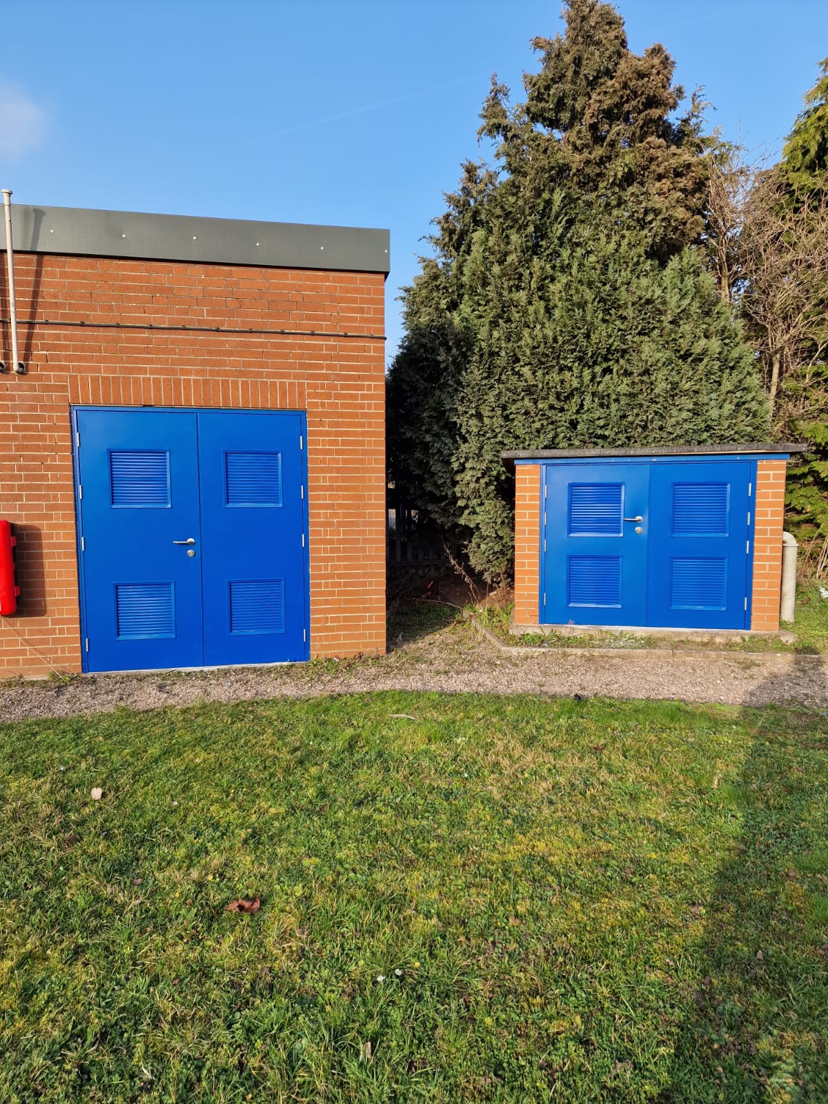 Steel doors with louvered panels