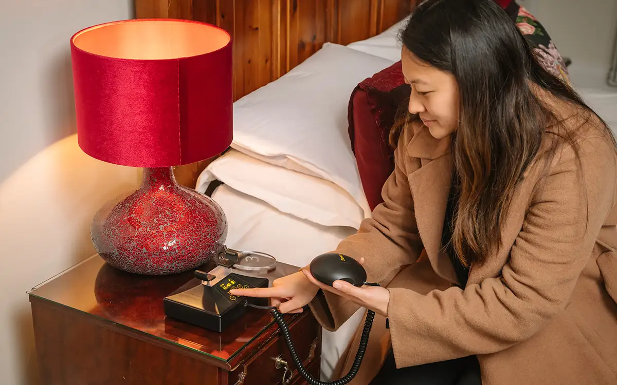 a hotel guest uses Deafgrad from Fireco in her room