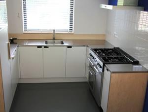 Stainless Steel Surfaces central to reconfigured 70s house