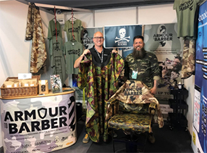 Neocape celebrates successful fundraiser with armour to barber