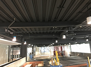 Metal ceiling soffit spraying