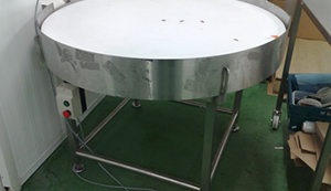 How can rotary turntables be used in the food industry?
