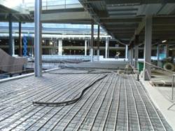 FlexiDry fast drying floor screed being installed at Westfield Stratford City