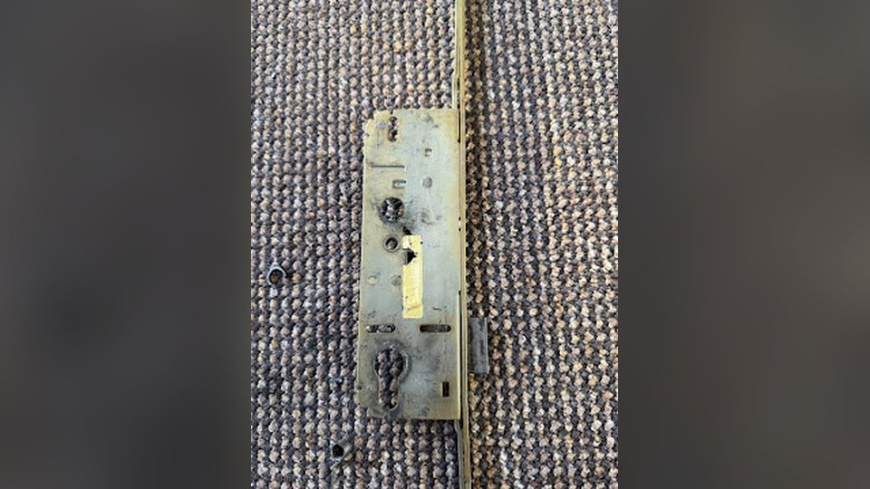 Worn UPVC multipoint lock gearbox removed by Belfast locksmith