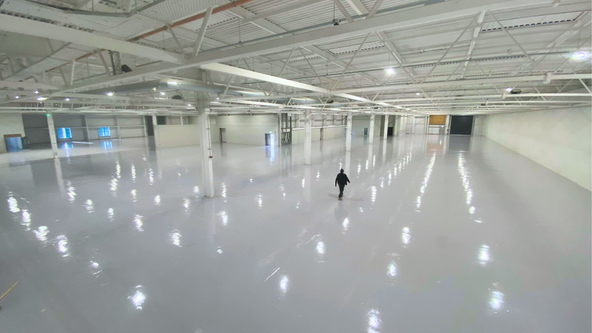 A warehouse floor with epoxy resin coating