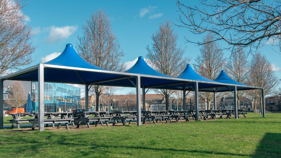 Modern A&S Landscape fabric all-weather canopies adding striking covered spaces for schools.