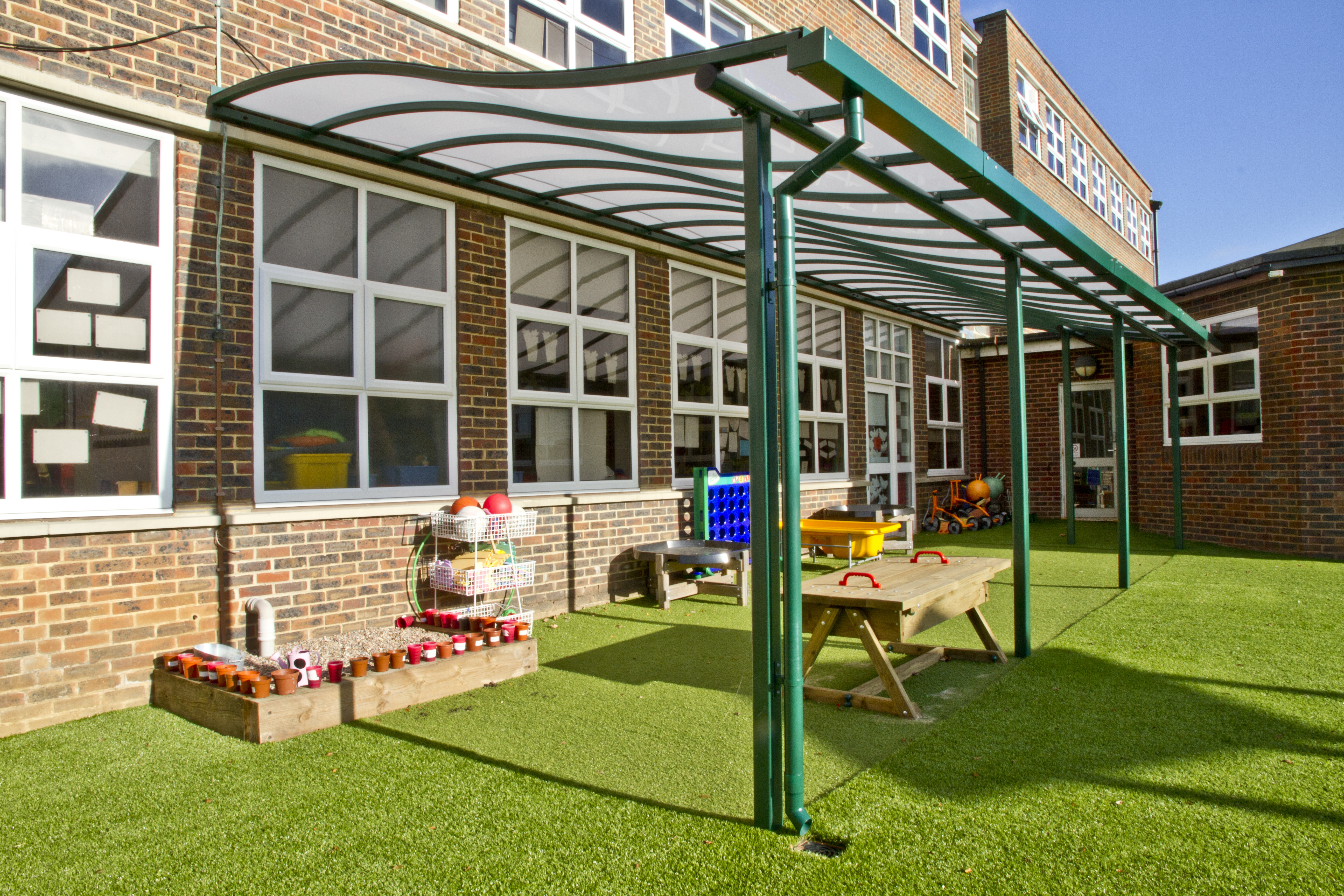 school canopy with wave feature roof