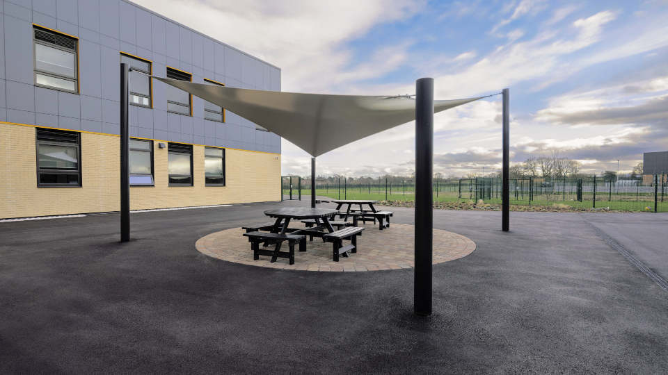 Bespoke fabric tensile canopies by A&S Landscape designed for school play and dining.