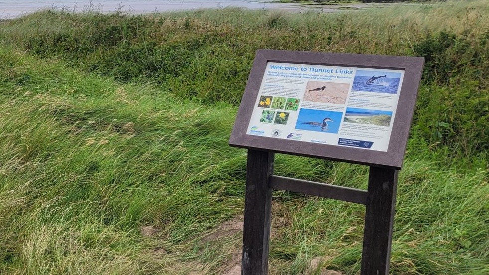 A coastal location for an interpretation panel, produed in GRP and supplied with a lectern frame produced in Recycled Plastic.  Shelley Signs.