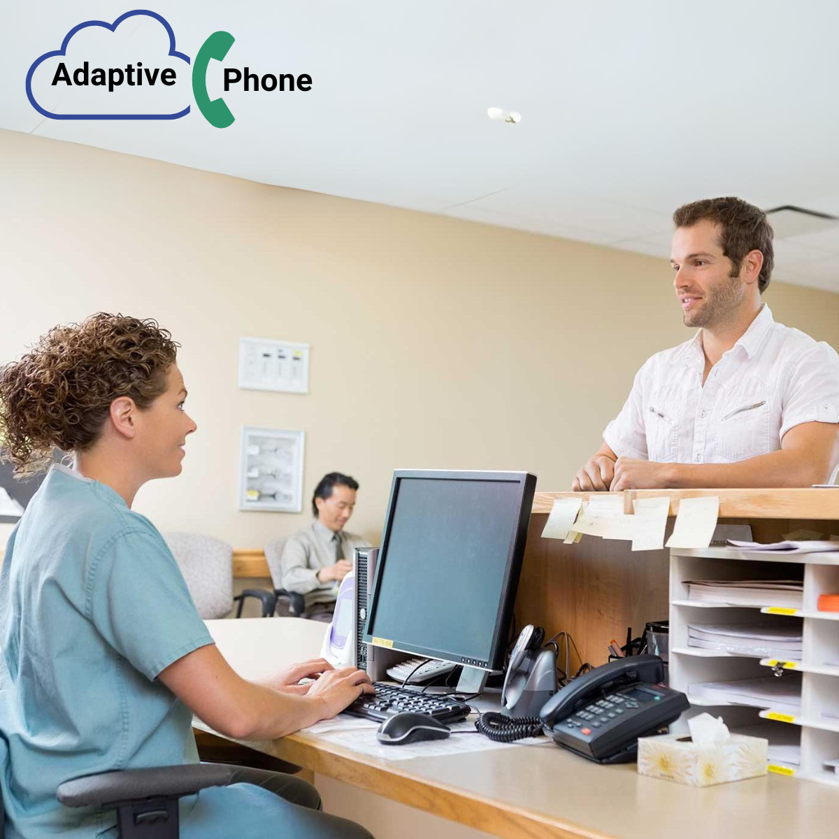 Adaptive Phone GP Digital Phone System Nurse Receptionist and Male Doctor Talking and Smiling (DHCS)